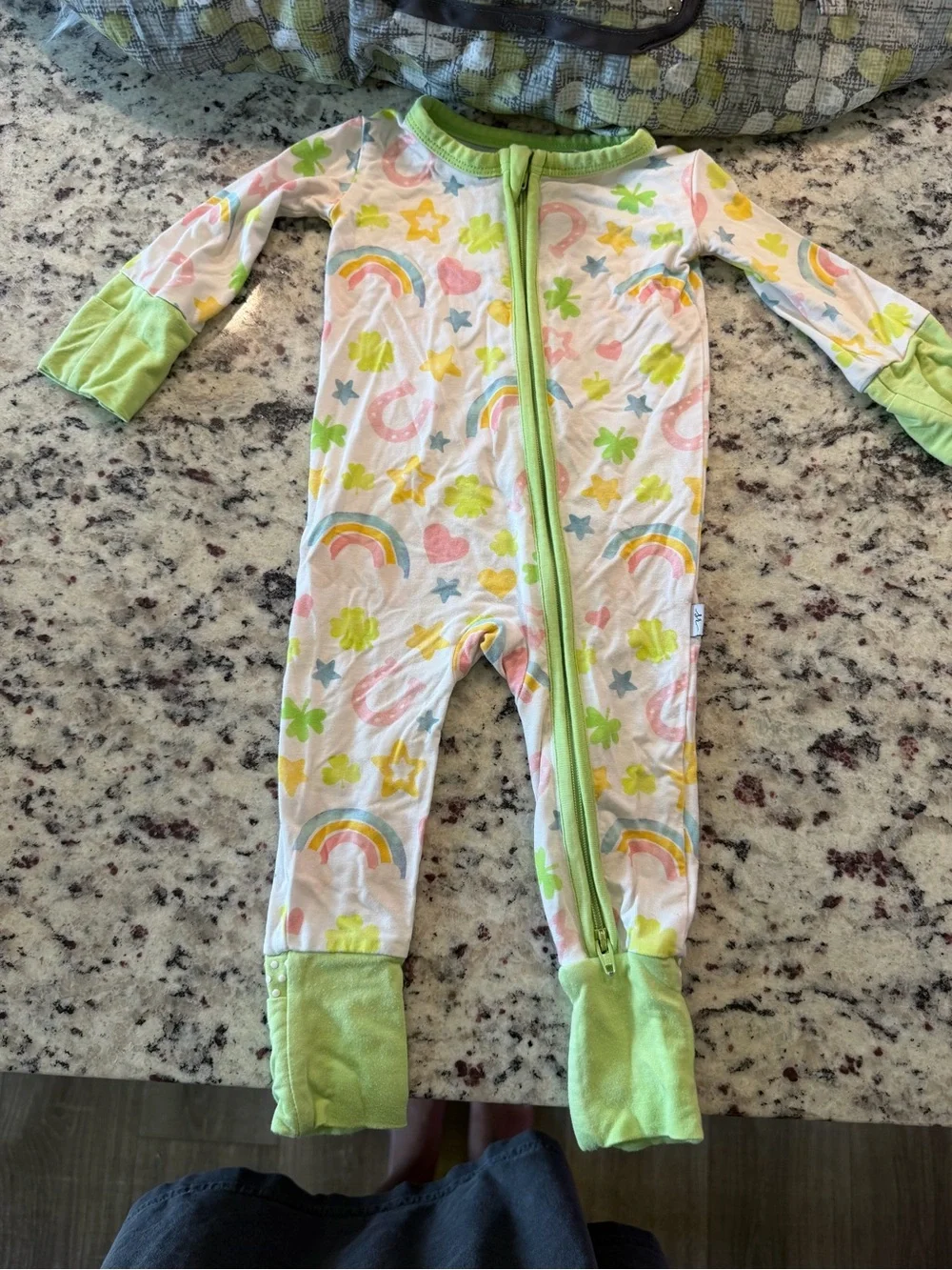 Newborn White Zip-Front Footed One-Piece with Pastel Rainbow Print